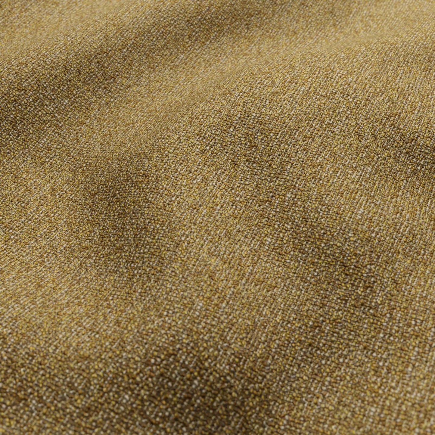 Golden-brown bouclé fabric close-up with textured, looped fibers and subtle sheen.