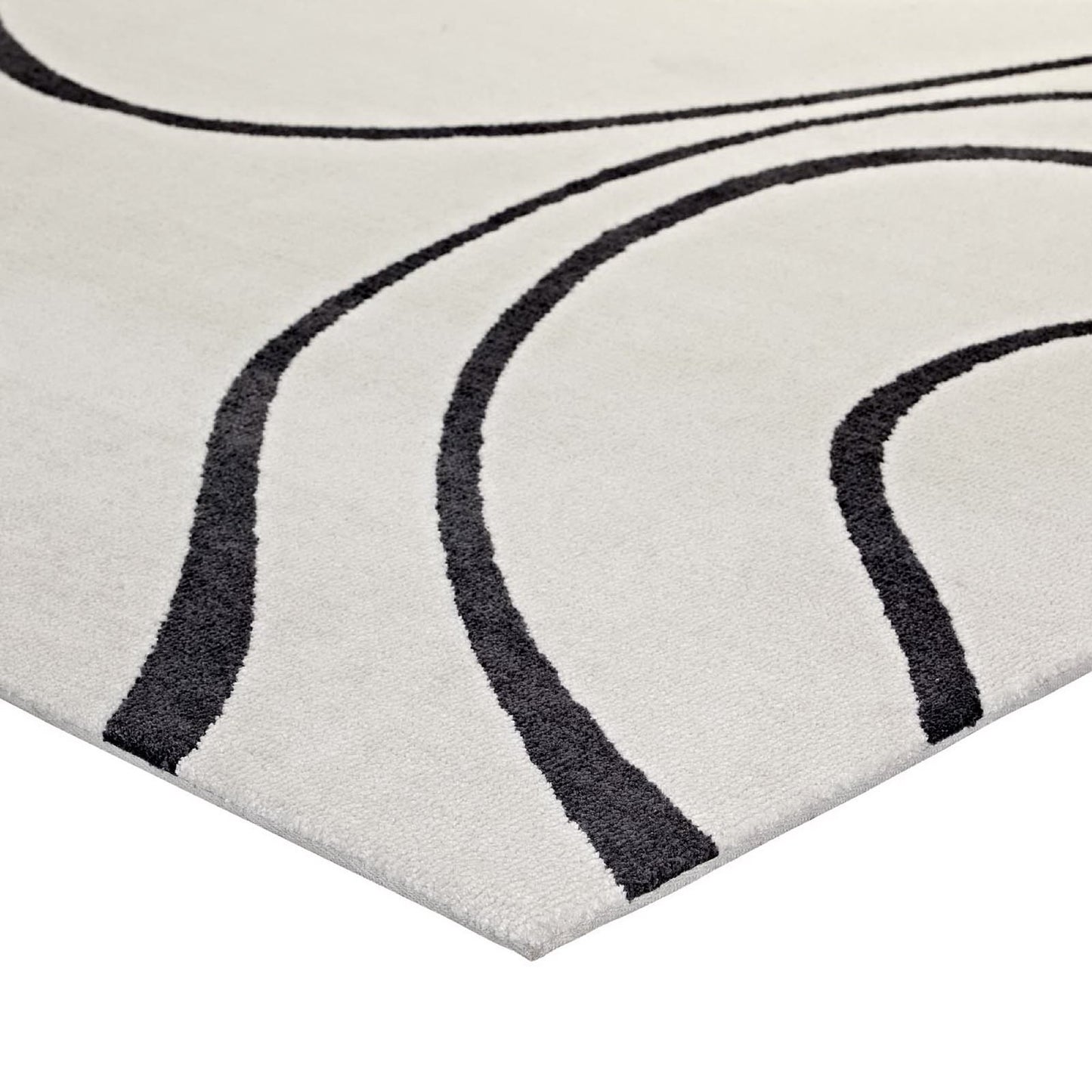 Ivory and charcoal abstract swirl rug with a soft pile for contemporary living spaces.