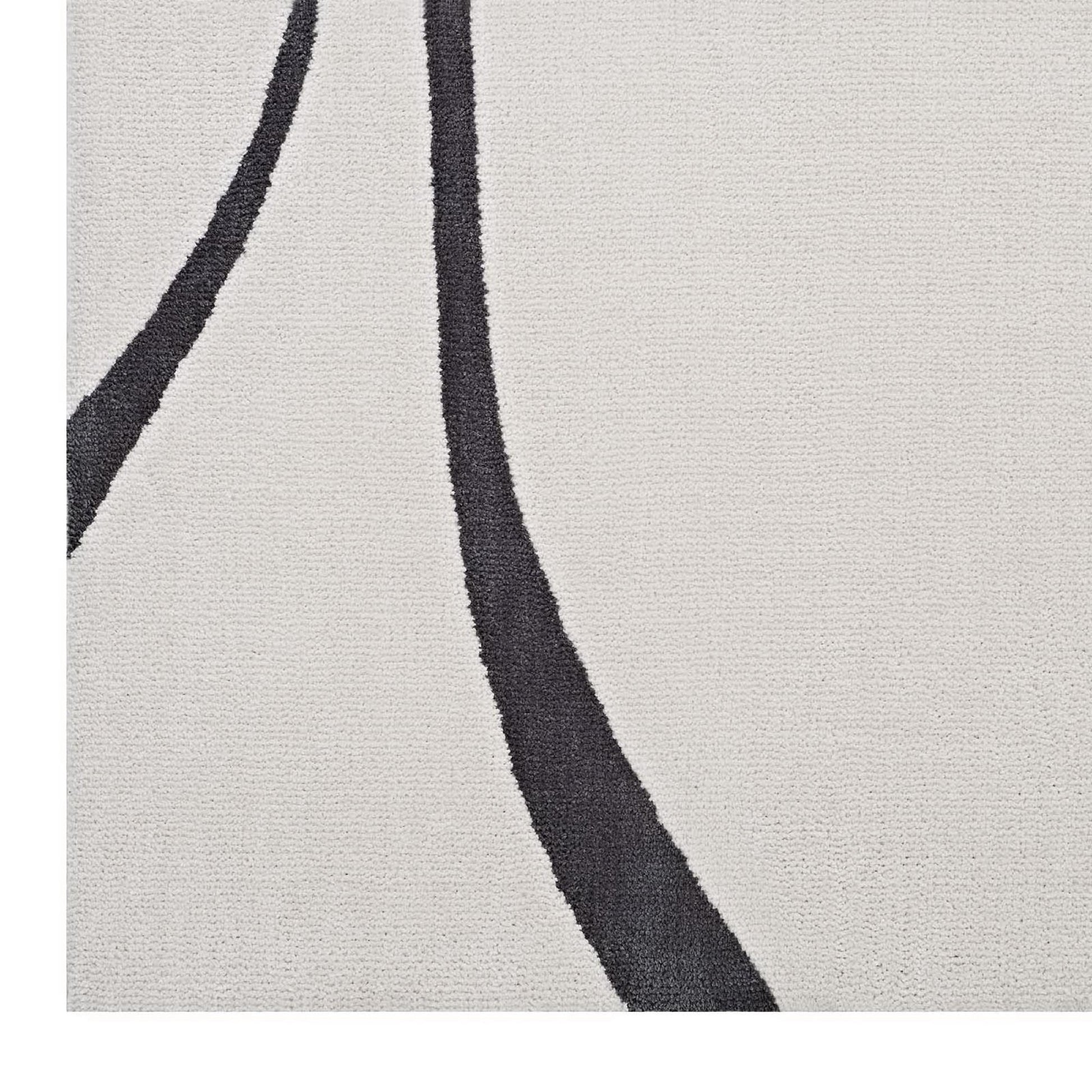 Beige textured rug with bold dark charcoal curved lines, abstract modern design.