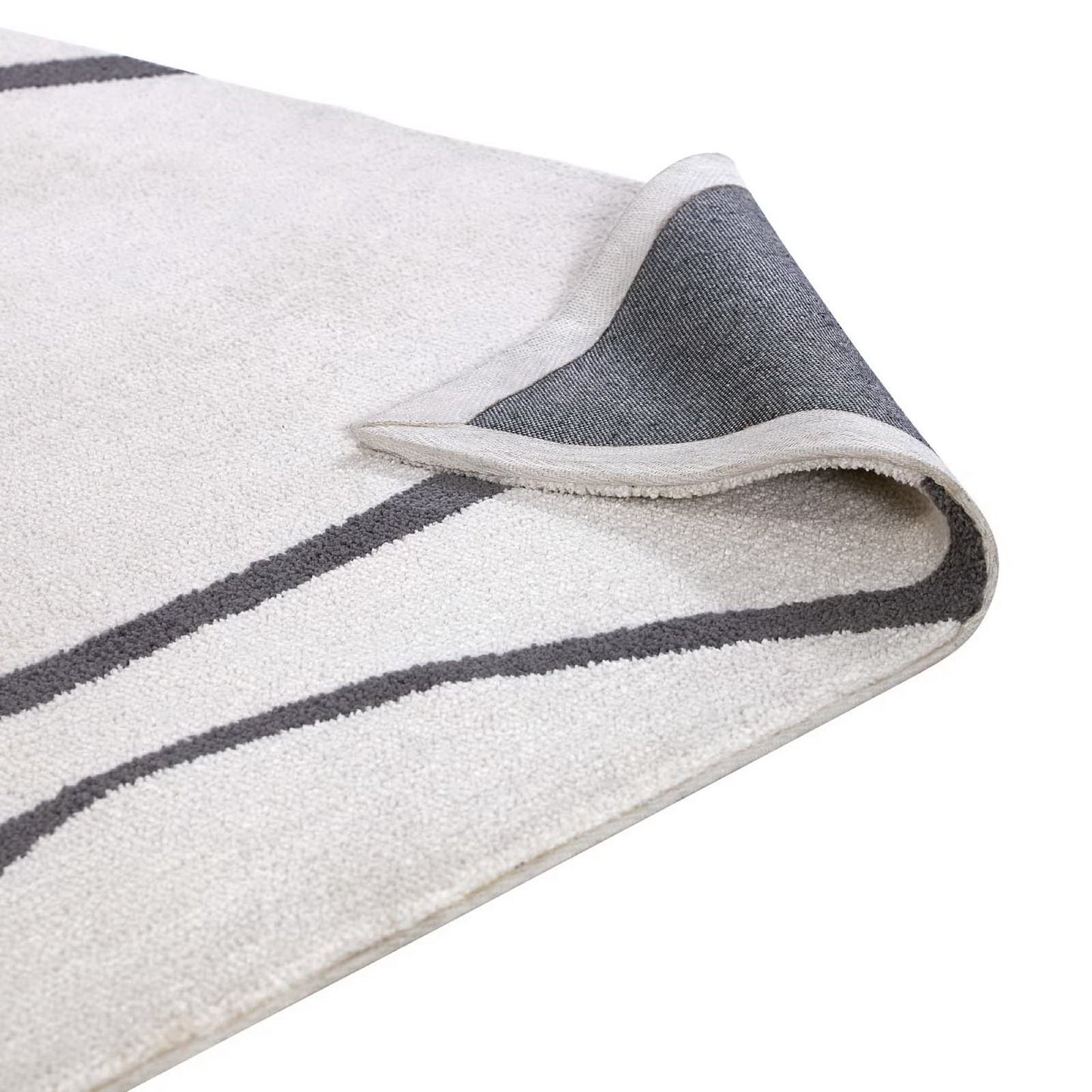Ivory and charcoal abstract swirl area rug, 5x8, soft pile.