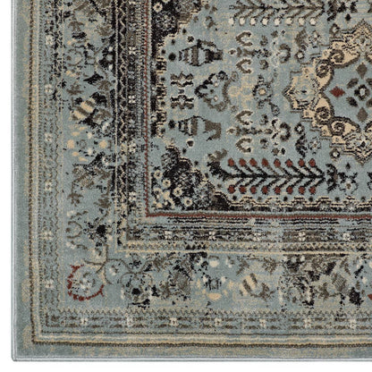 Blue-gray oriental rug with a multi-layer beige border, cream/brown floral motifs, and a distressed vintage look.