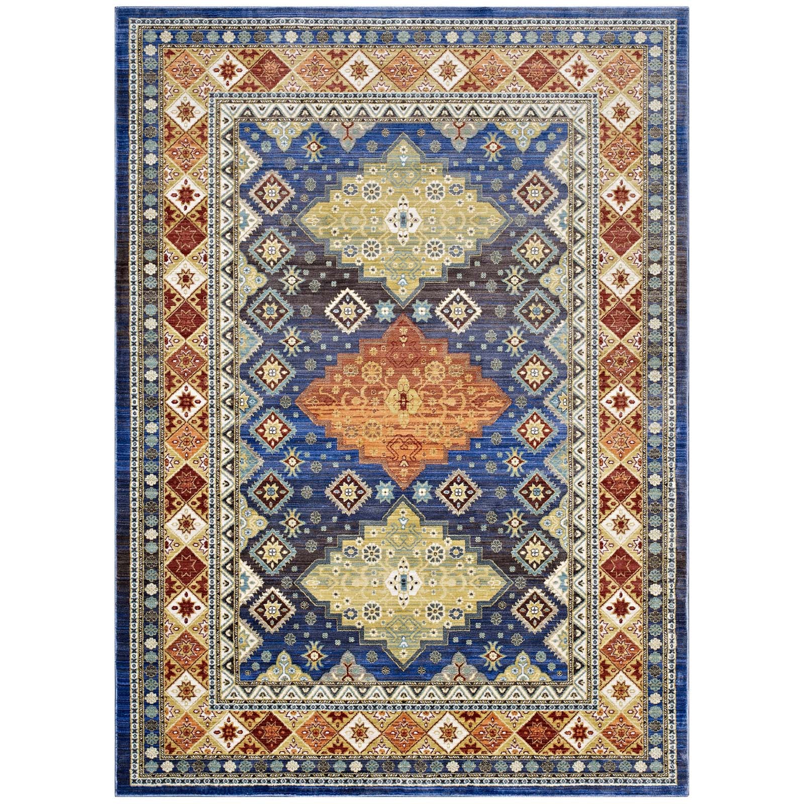 Colorful Southwestern diamond floral area rug with a blue field and three central diamond motifs in yellow and orange, bordered by navy, cream, and red.