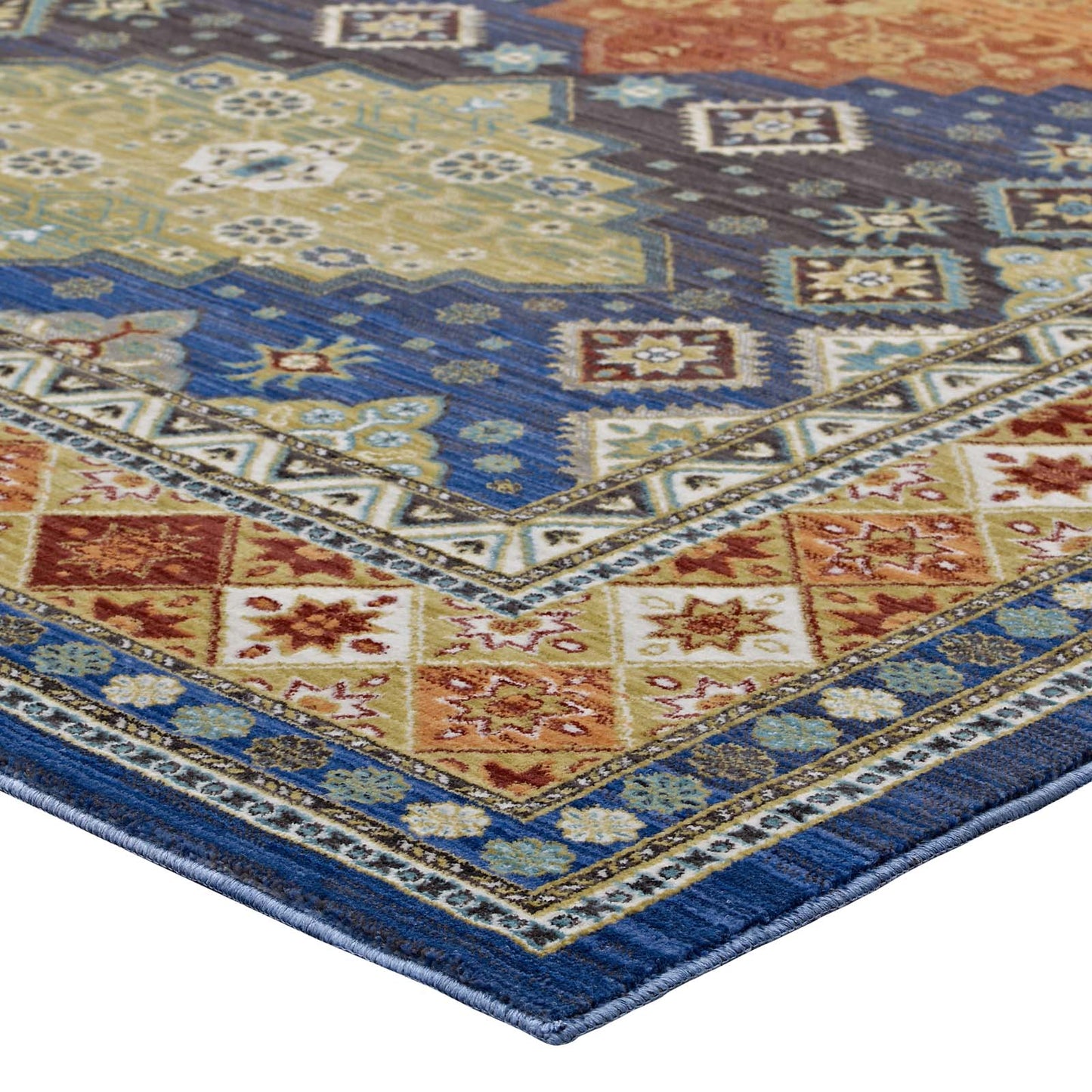 Vibrant Southwestern Diamond Floral area rug with blue border and multicolor accents in red, yellow, green and cream.
