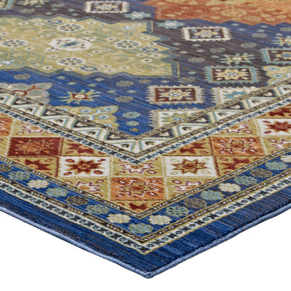 Vibrant Southwestern Diamond Floral area rug with blue border and multicolor accents in red, yellow, green and cream.