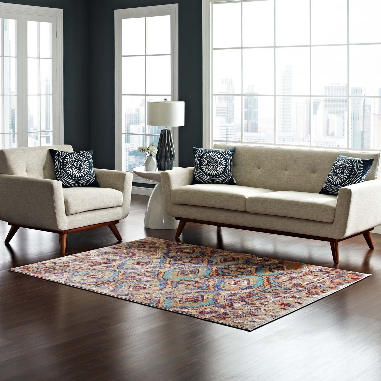 Multicolored distressed Southwestern Aztec area rug in a living room.