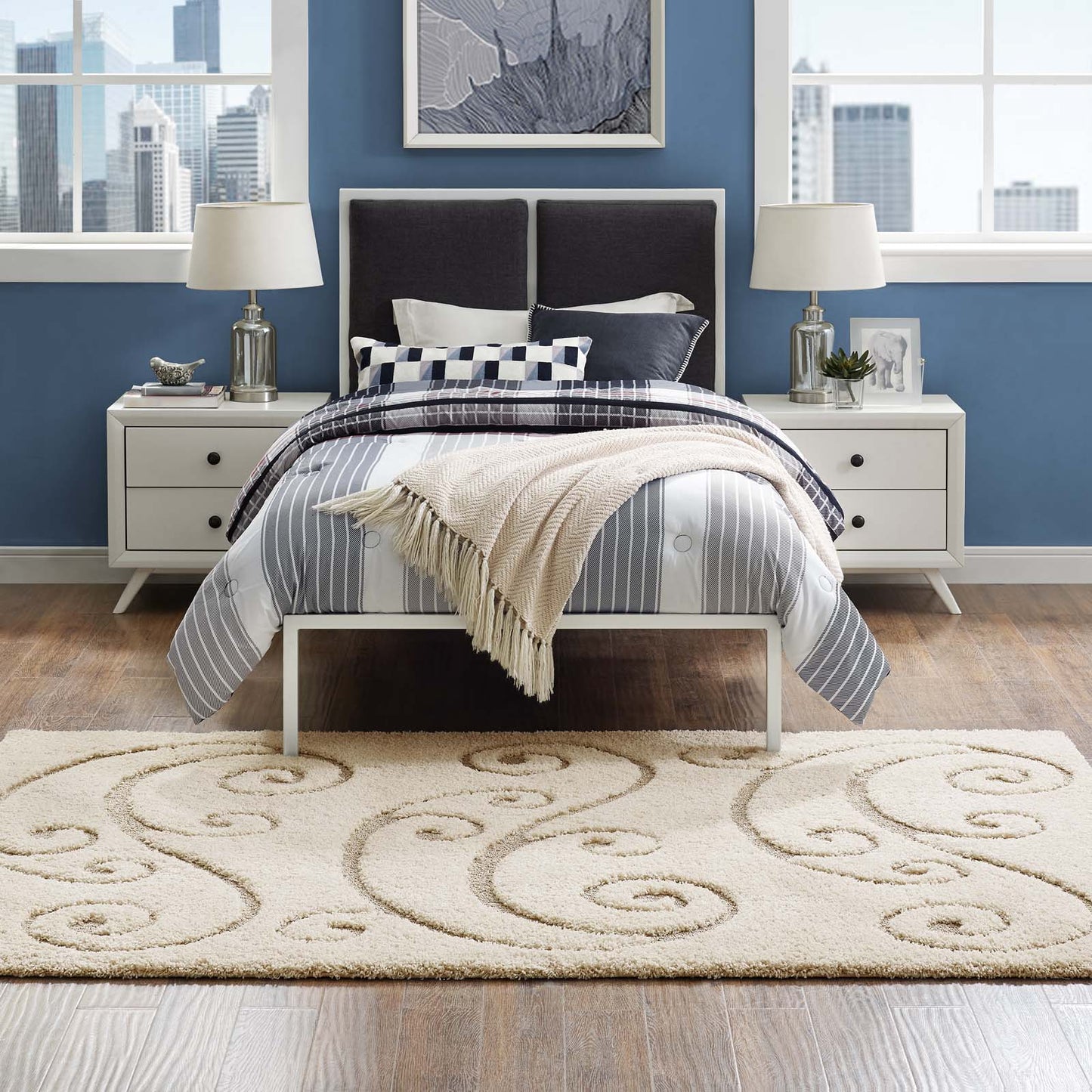 Cream and beige scrolling vine shag area rug, 8x10, on the floor.