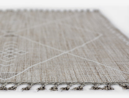 Gray textured woven rug with white cross lines and tassel fringe along the edge (5' x 8').
