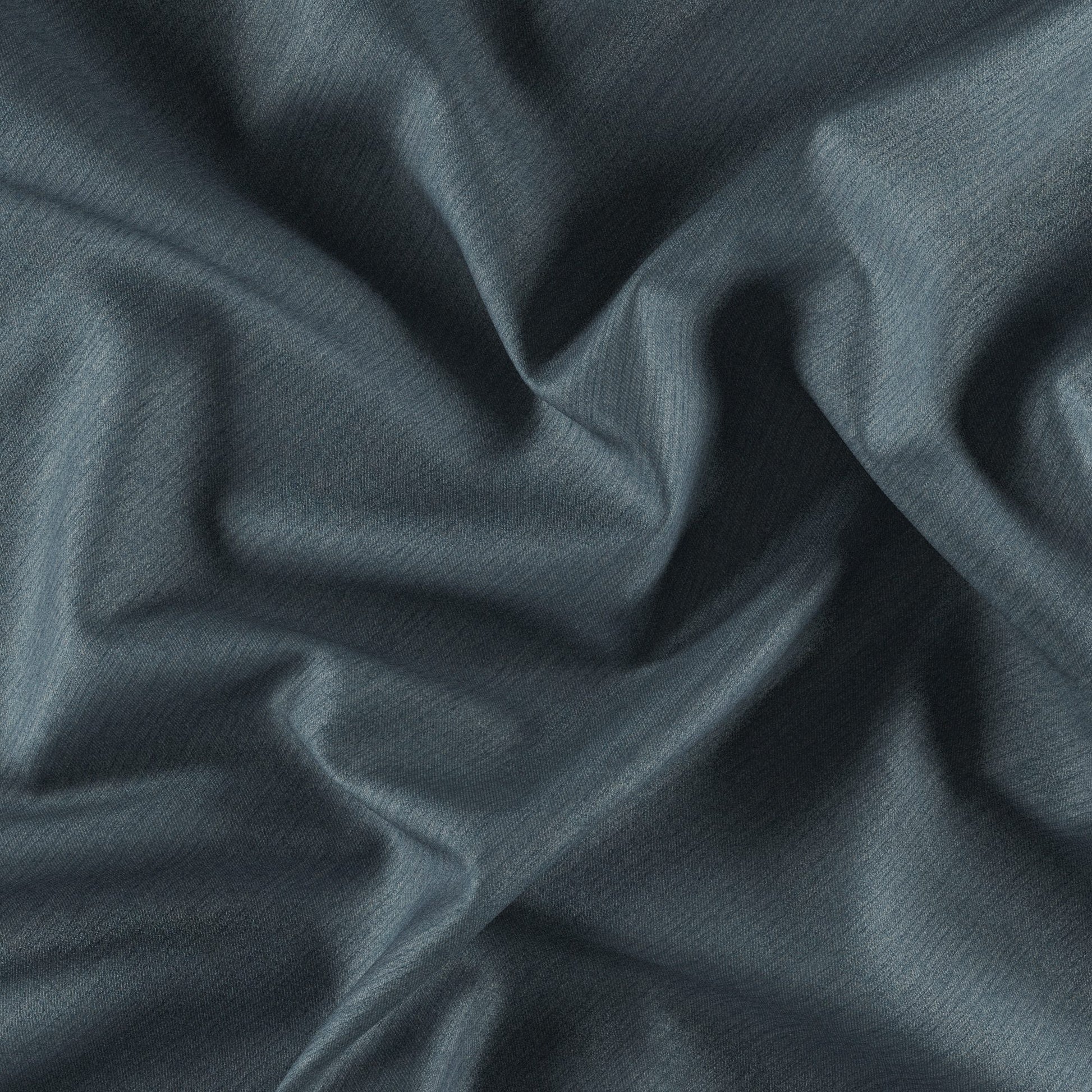 Dark blue-gray dimout fabric with soft folds and subtle texture.