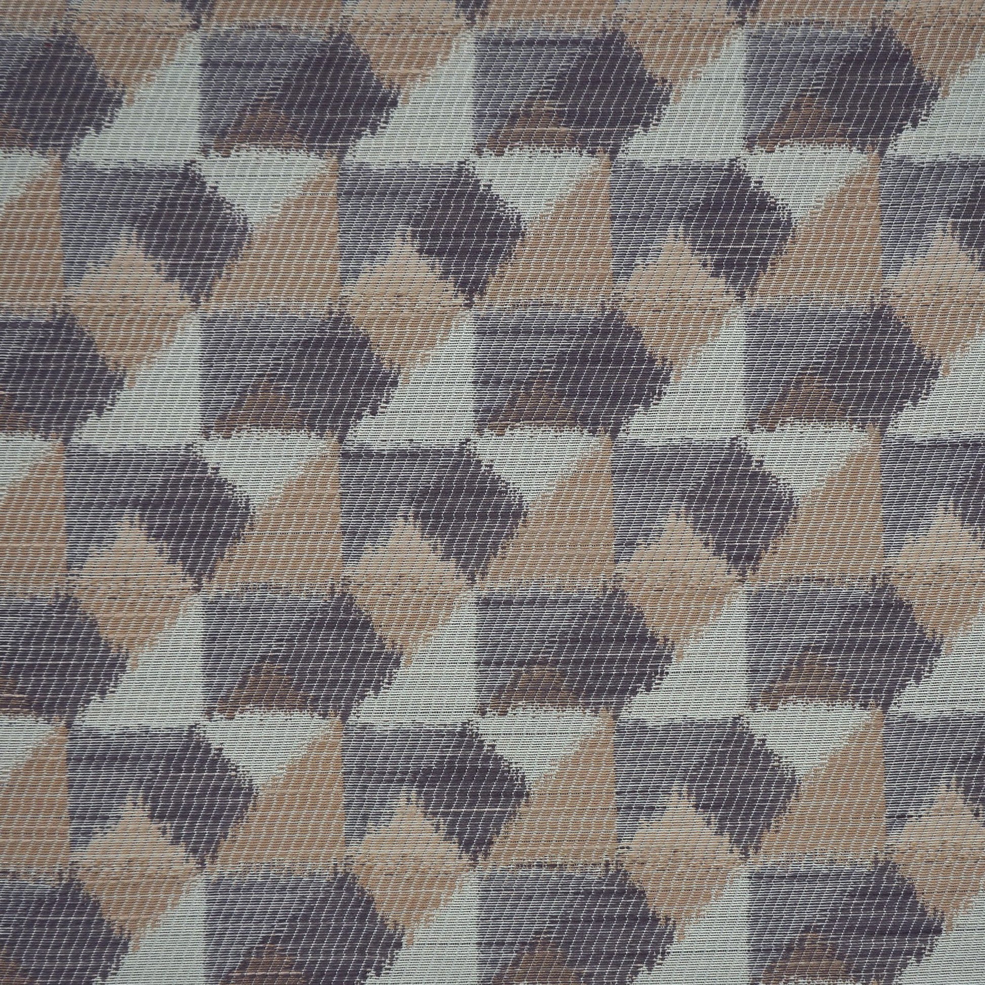 Geometric triangle-patterned woven fabric in tan, taupe, gray—modern upholstery textile.