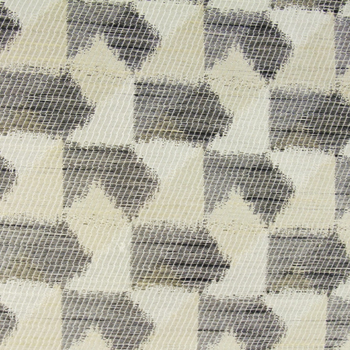Geometric chevron diamond pattern in cream and gray, woven fabric texture for upholstery or throws.