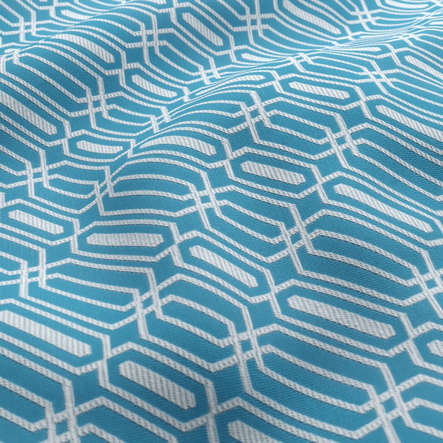 Light blue fabric with a white geometric trellis pattern, creating interlocking hexagon-like shapes.