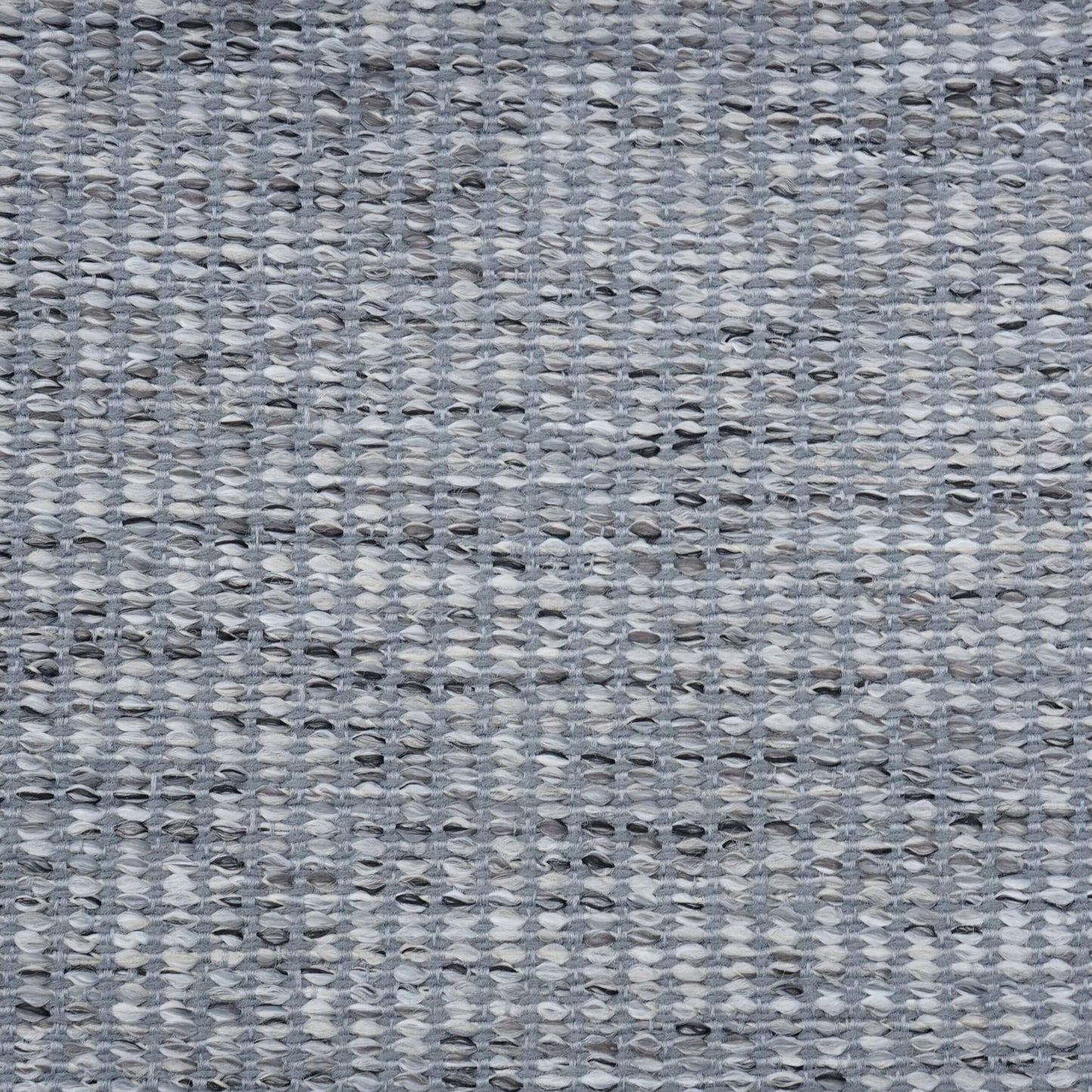 Blue-gray boucle fabric with a subtle textured weave.
