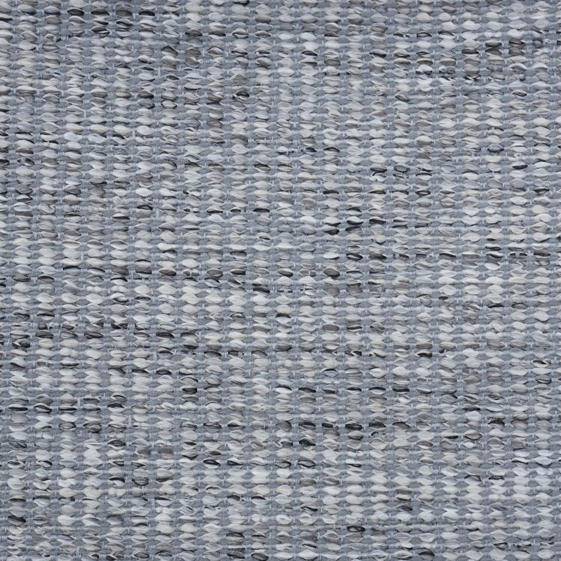 Blue-gray boucle fabric with a subtle textured weave.