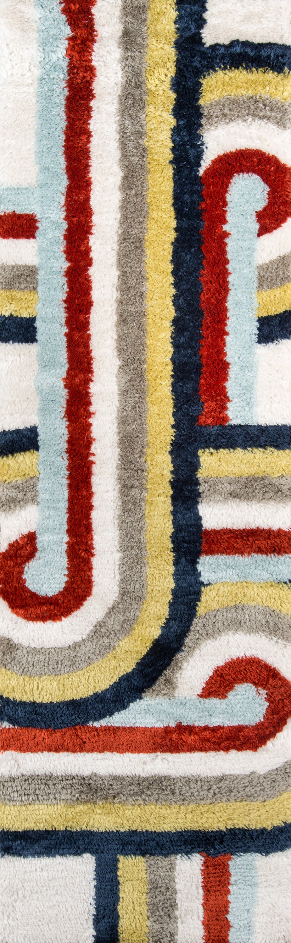Shaggy retro rug with bold multicolor looping border in red, navy, mustard, cream and teal; geometric vintage textile.