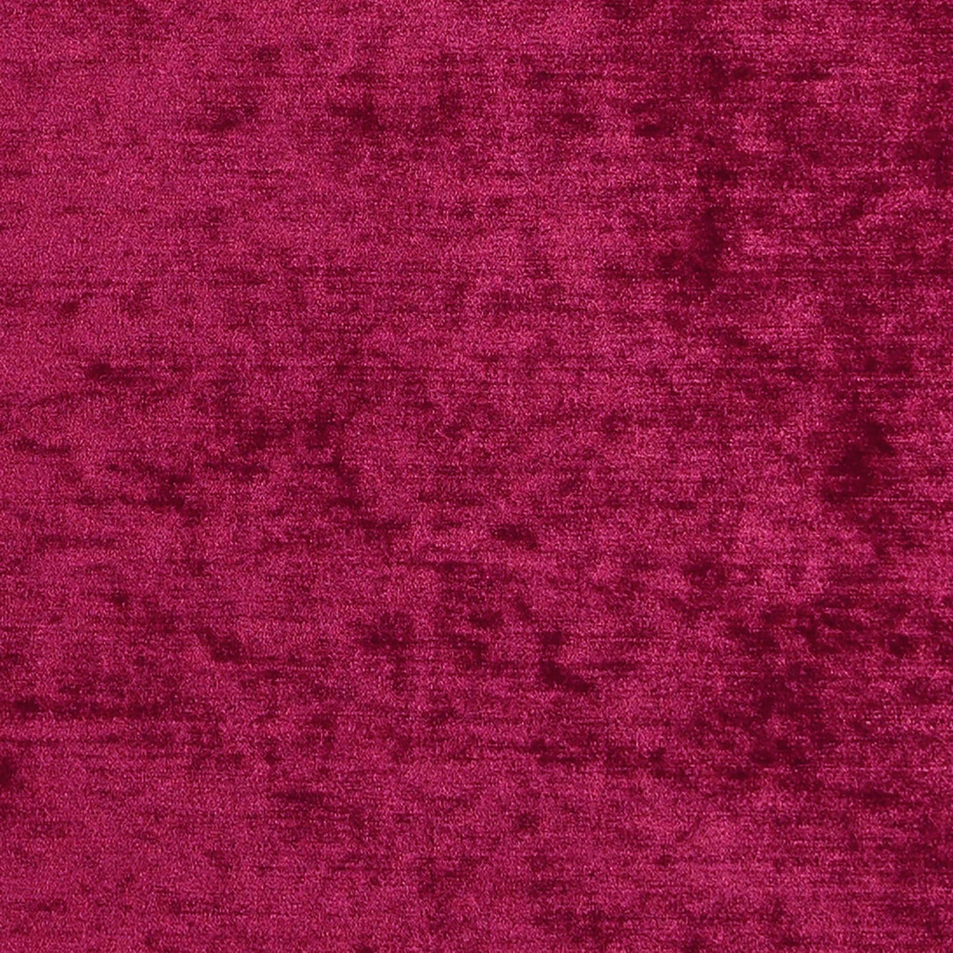Deep burgundy chenille fabric with plush nap; suitable for upholstery or drapery.