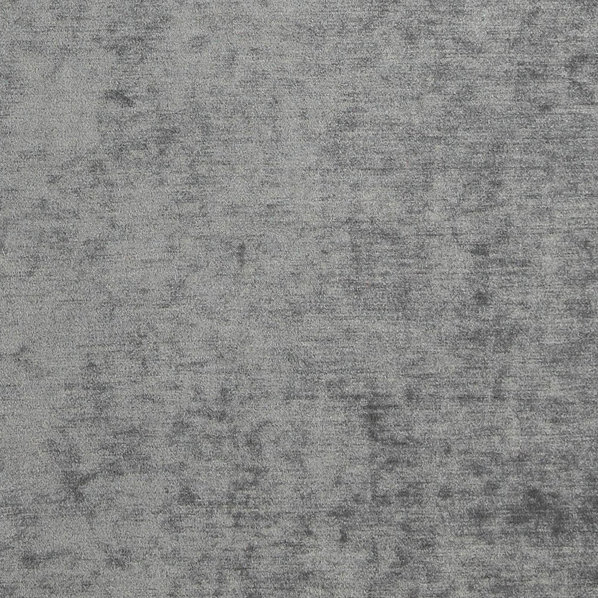 Grey mottled chenille fabric close-up with plush texture.