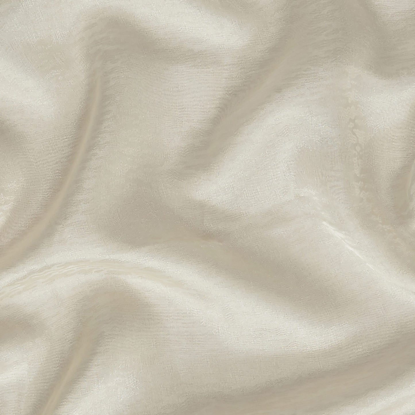 Ivory ripple jacquard sheer fabric with soft drape; wide width, for apparel and home decor.