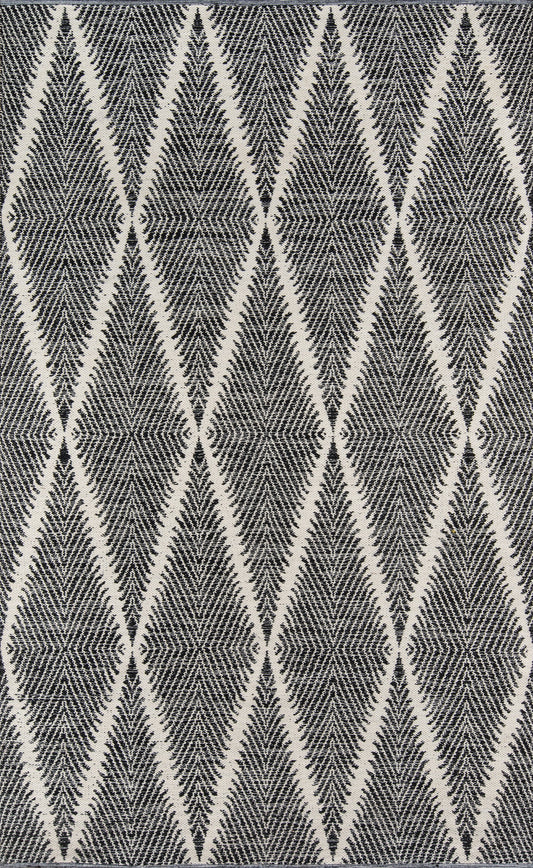 Geometric black & ivory diamond-pattern area rug with textured zigzag detailing.