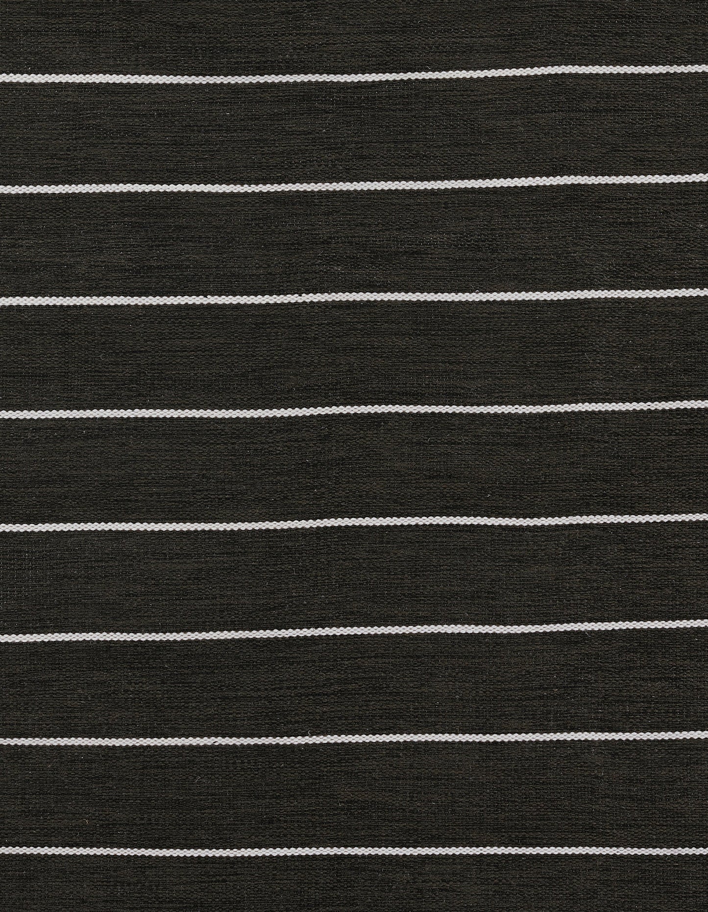 Charcoal black rug with thin white horizontal stripes; 9' x 12' rug.