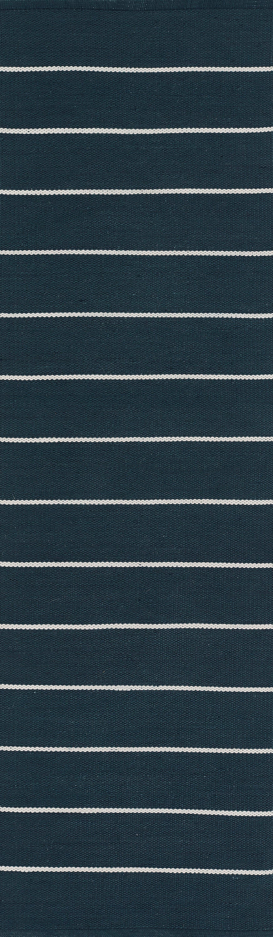 Navy blue knit fabric with thin white horizontal stripes; casual striped textile.