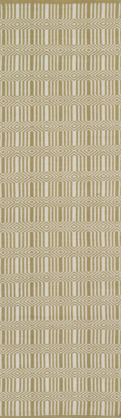 Gold and ivory geometric hex pattern on beige; repeating rug with a modern mid-century vibe.