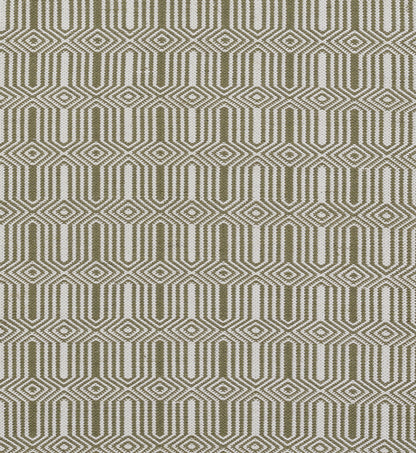 Olive green & cream geometric woven rug with interlocking diamond pattern.