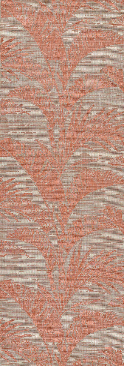 Coral-pink palm leaf pattern on beige rug; tropical botanical design.