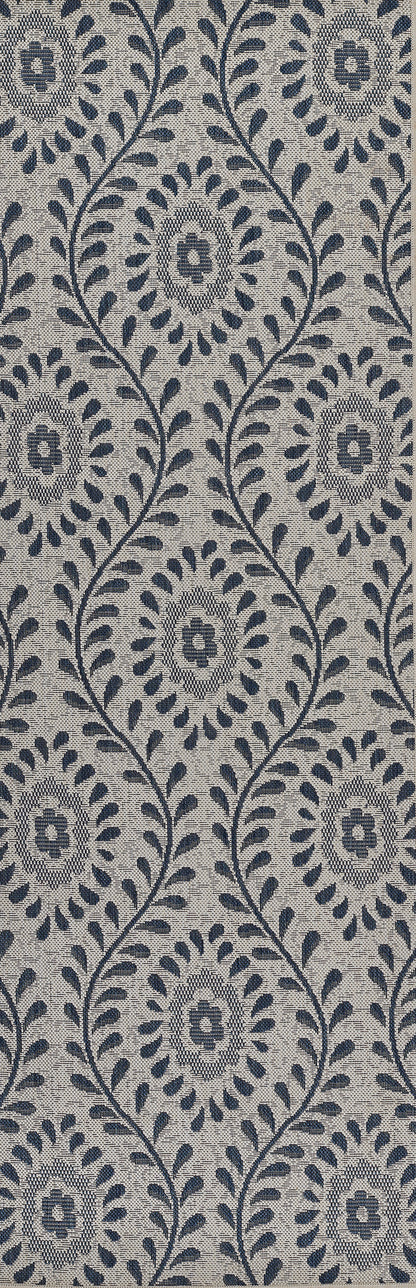 Blue damask pattern with navy floral medallions on gray background rug; classic, elegant decor.