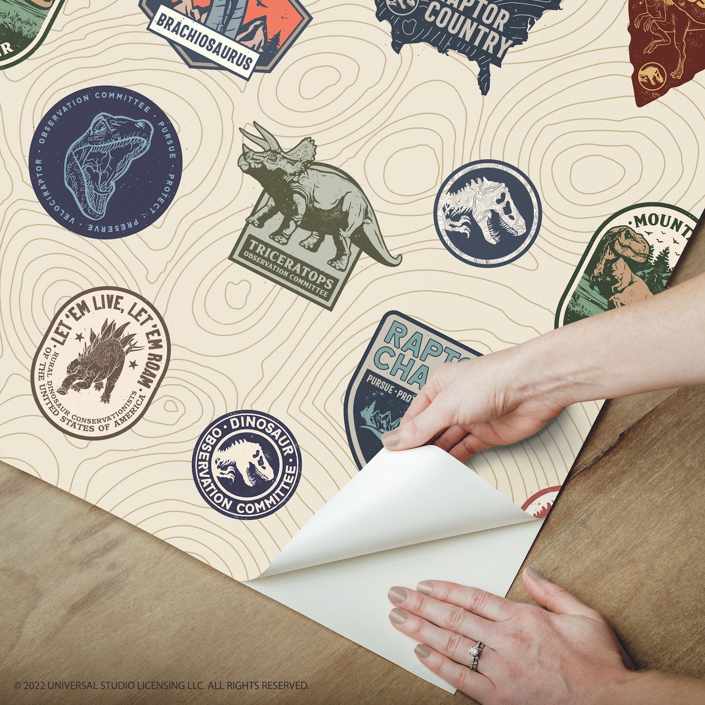 York Wallcoverings RoomMates Jurassic World Badges Peel and Stick Wallpaper  Licensed Multicolor  Wallpaper - RMK12397RL