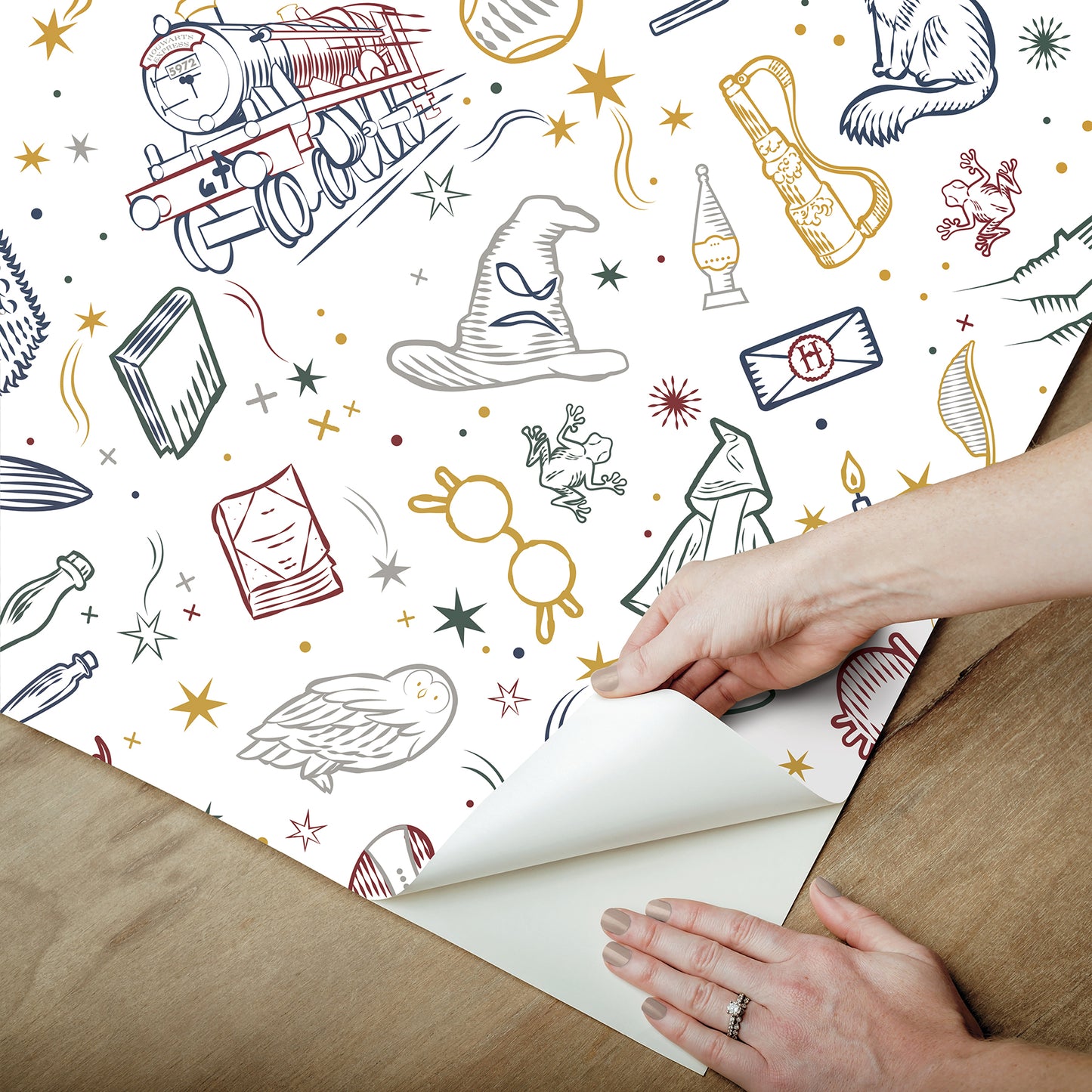 York Wallcoverings RoomMates Harry Potter Magical Icons Blue Peel and Stick Wallpaper Whimsical Graphics Whites and Off-Whites  Wallpaper - RMK12592RL