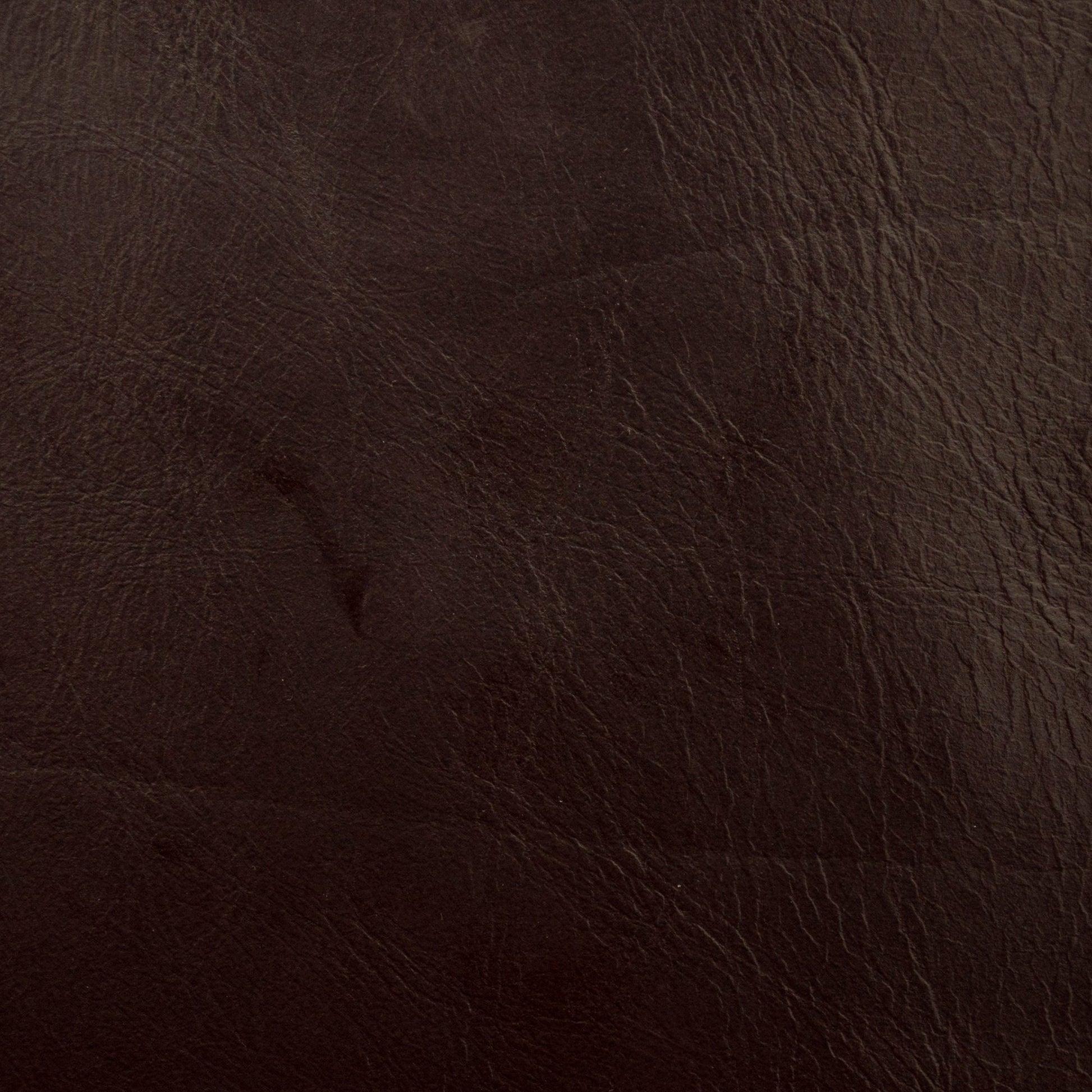 Dark brown vegan leather texture close-up with visible grain and subtle sheen; rustic, premium upholstery fabric.