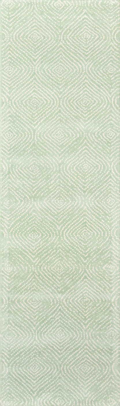 Pale sage green woven fabric with subtle white geometric diamond lattice pattern; lightweight upholstery or drapery material.