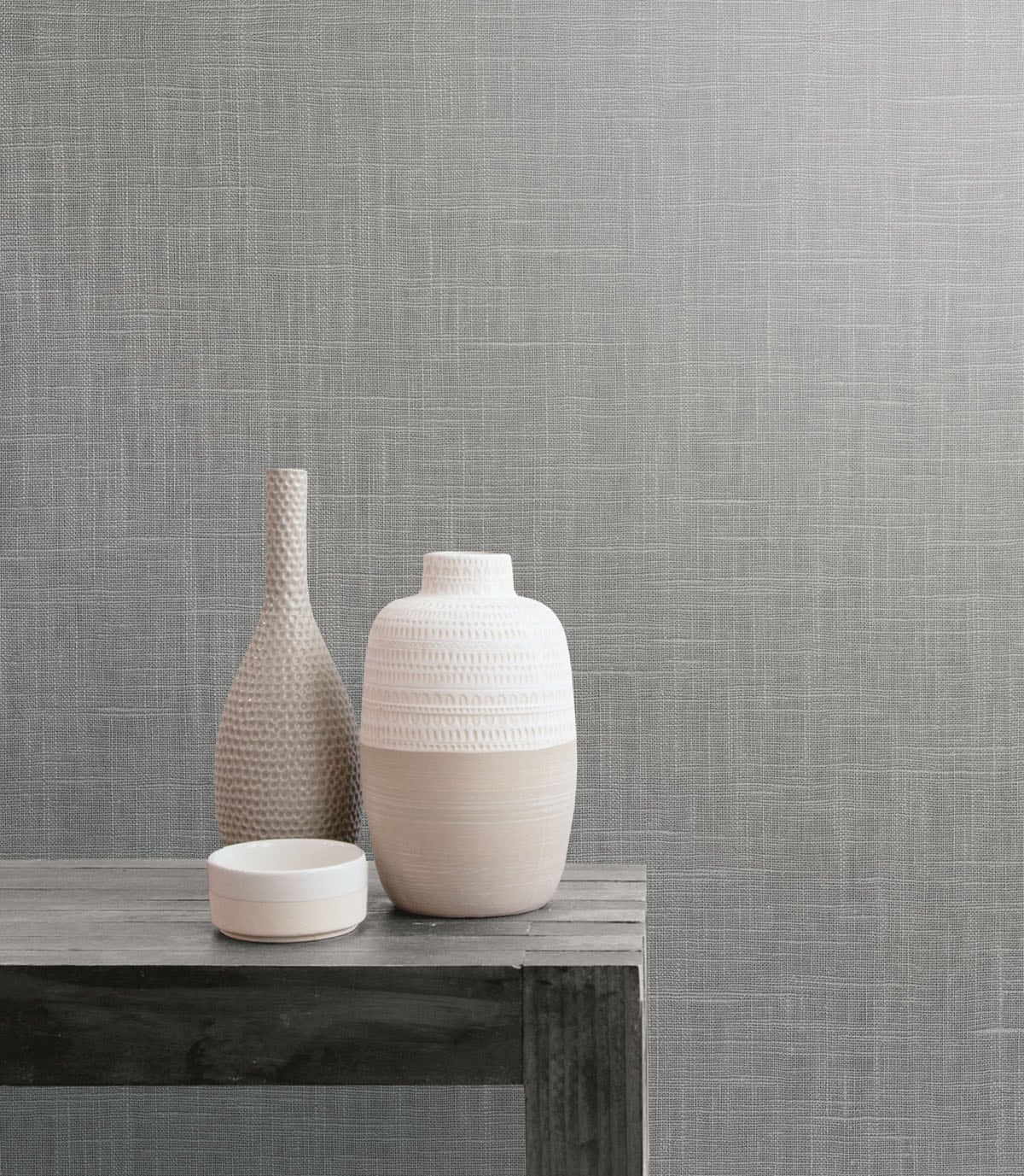 Neutral grey matte embossed vinyl decor on a rustic wood table.