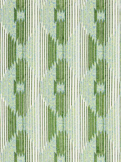 Abstract geometric fabric pattern with vertical green stripes and pale blue zigzag chevrons on white
