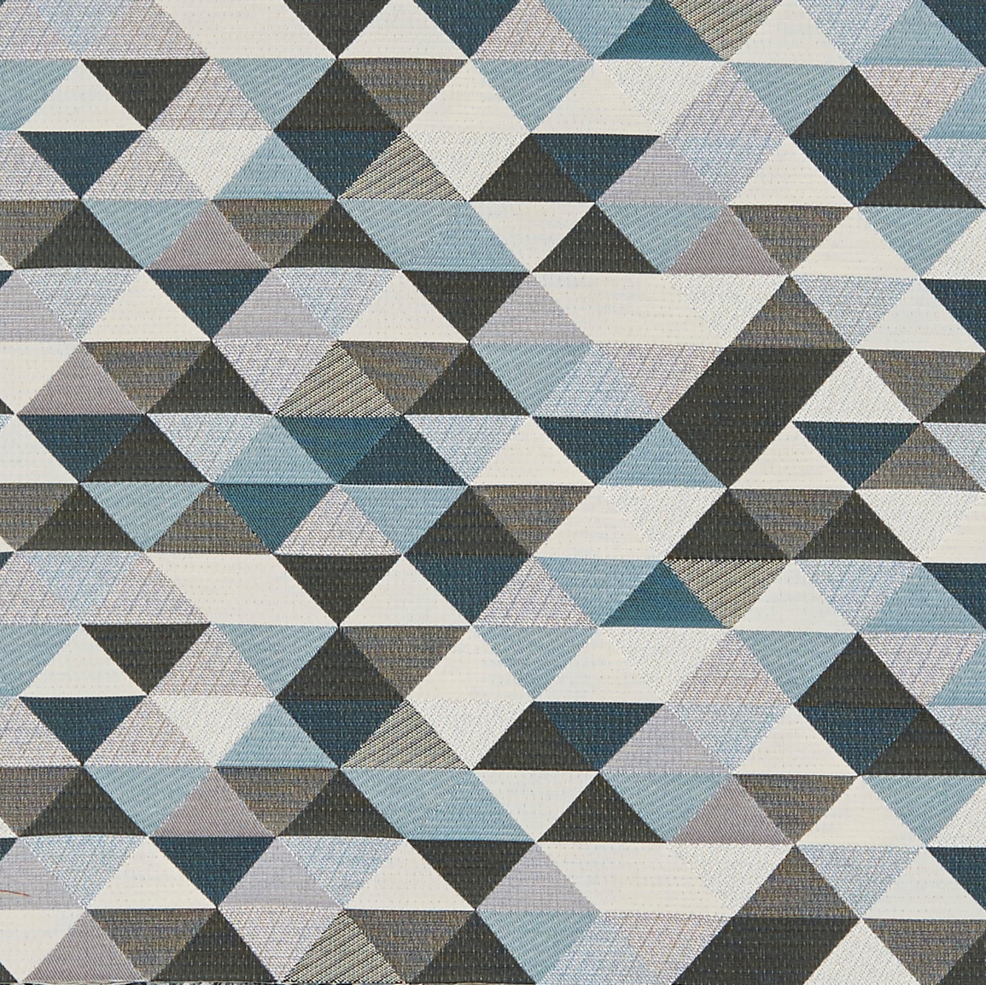 Geometric blue-gray triangles in a woven fabric forming diamond patterns in cool tones.