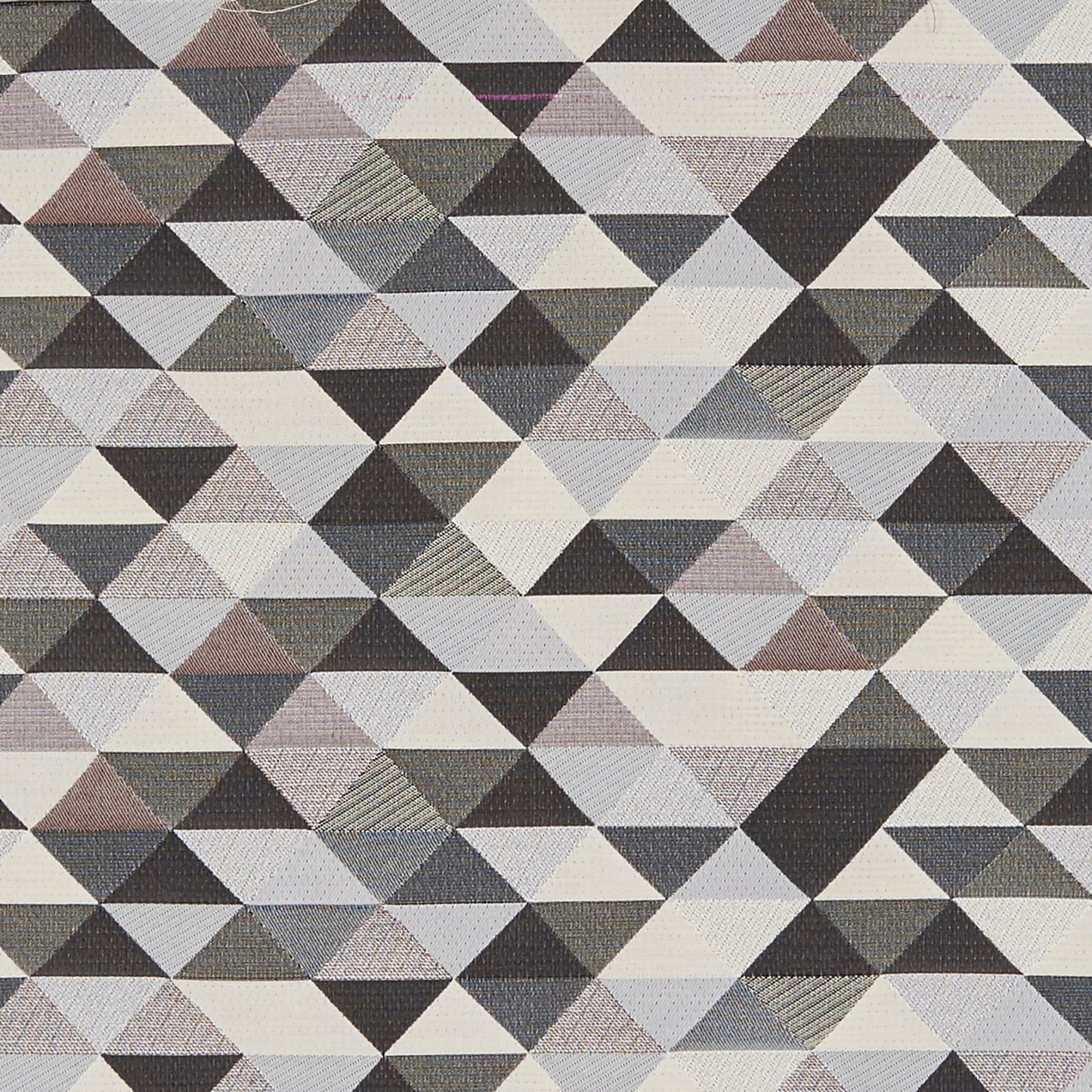 Geometric fabric pattern of small triangles in cream, taupe, gray and black forming diamonds.