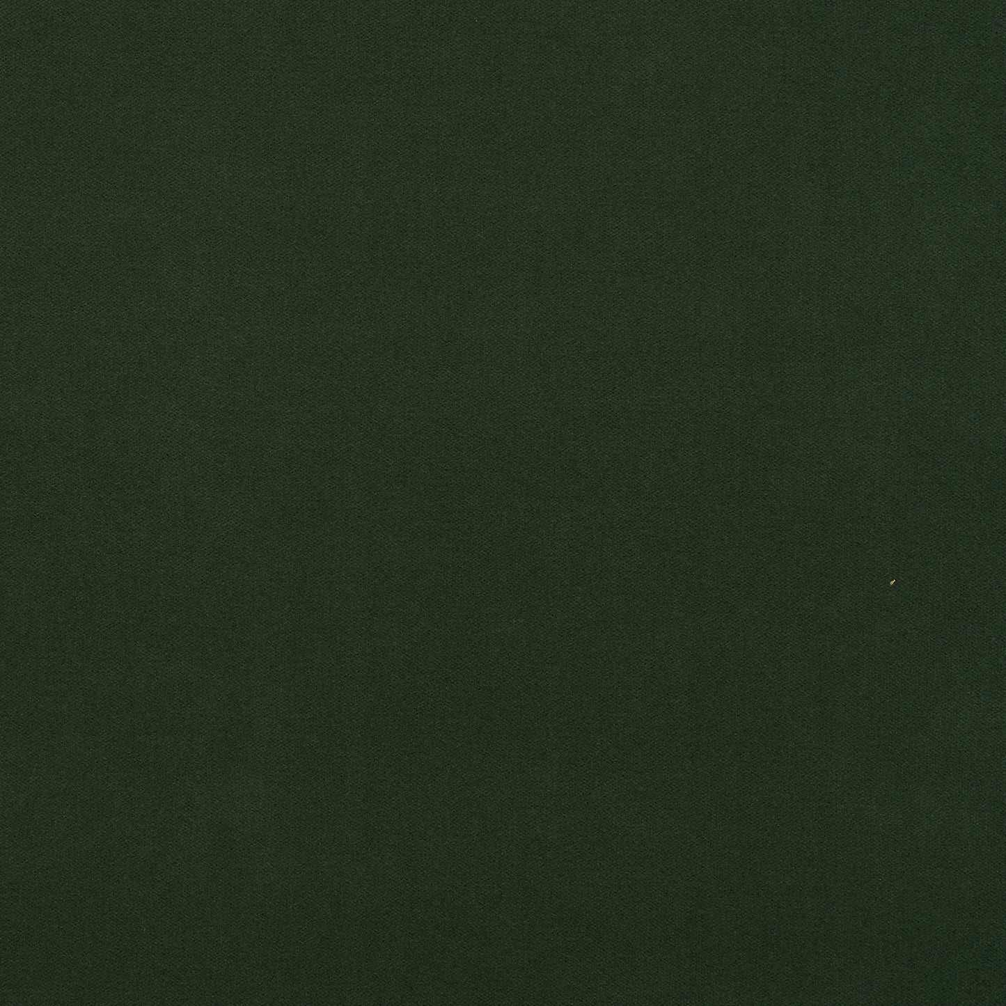 Dark green velvet fabric texture with a smooth surface and subtle nap, suitable for upholstery or garments.