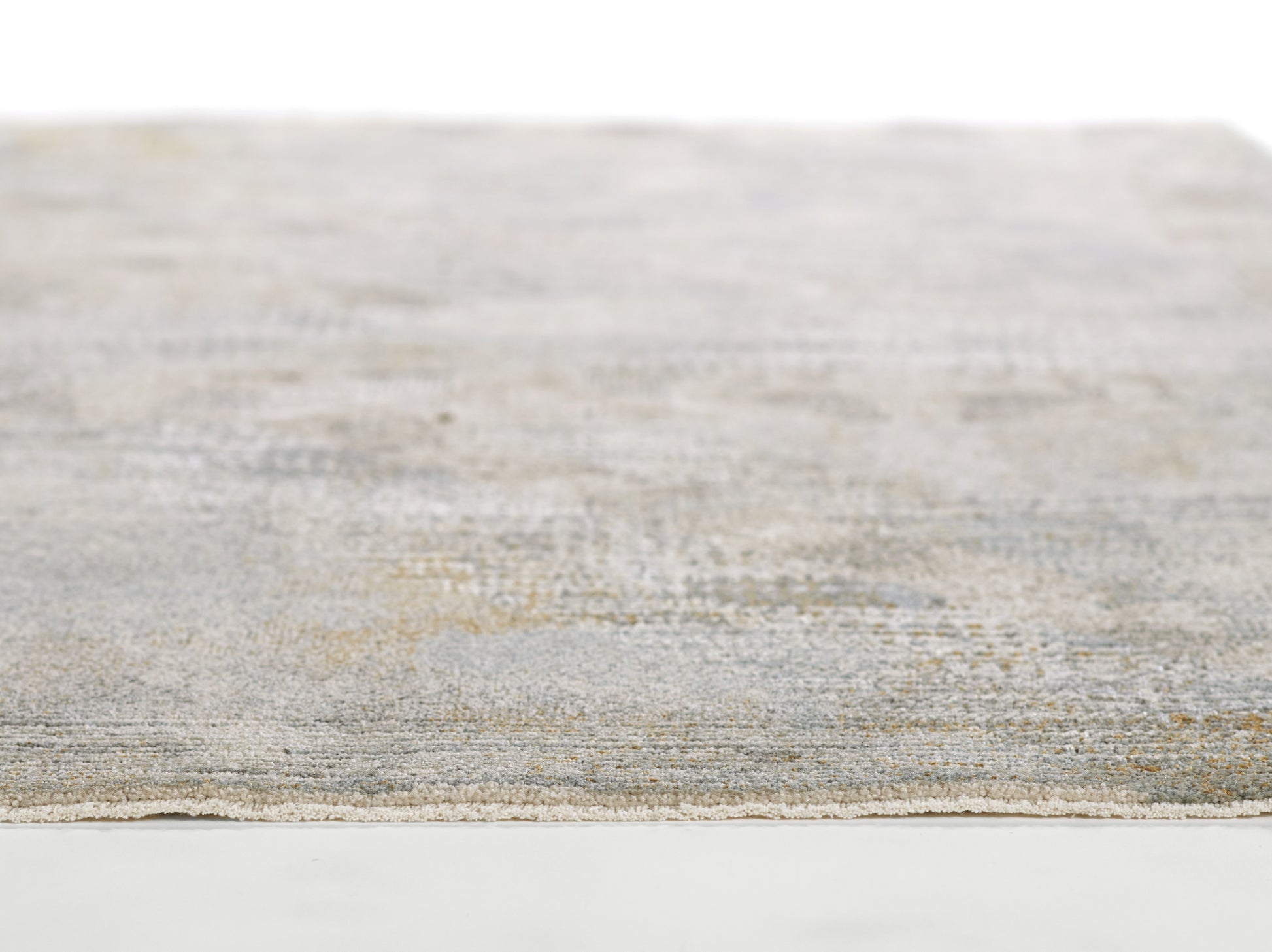 Blue flatweave rug with beige accents; blue-gray textured surface, close-up detail.