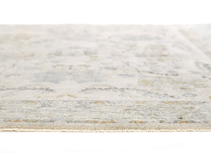 Blue and beige flat-weave rug with subtle distressed pattern and low pile.