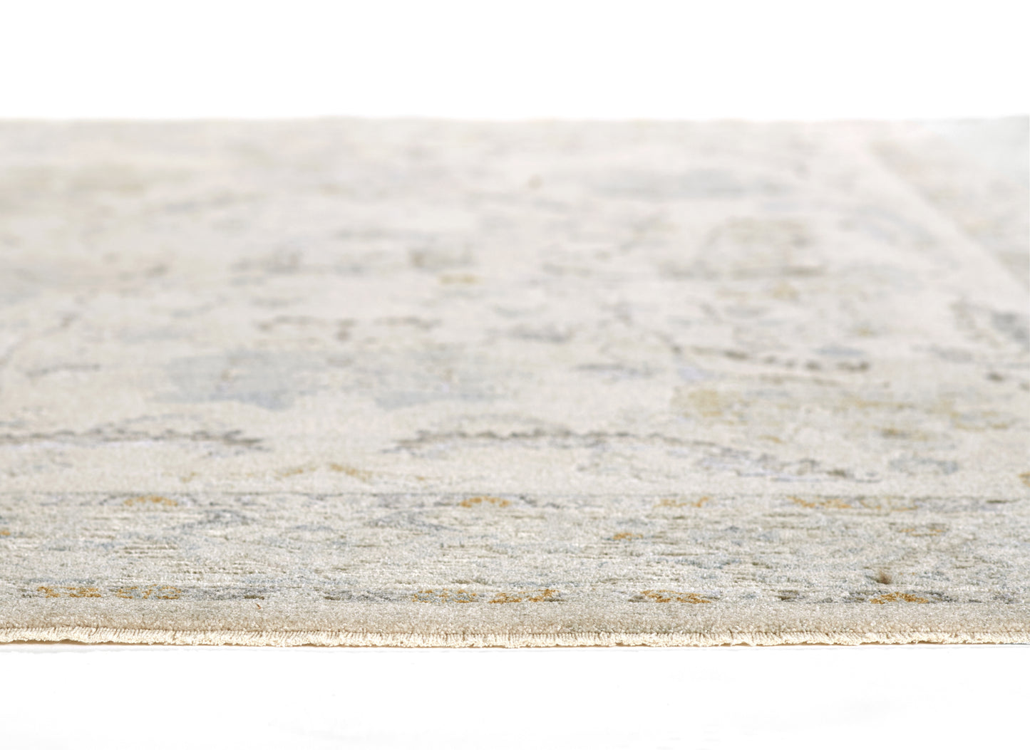 Rectangular flat-weave rug in pale blue, gray and beige with a subtle distressed pattern; versatile area rug.