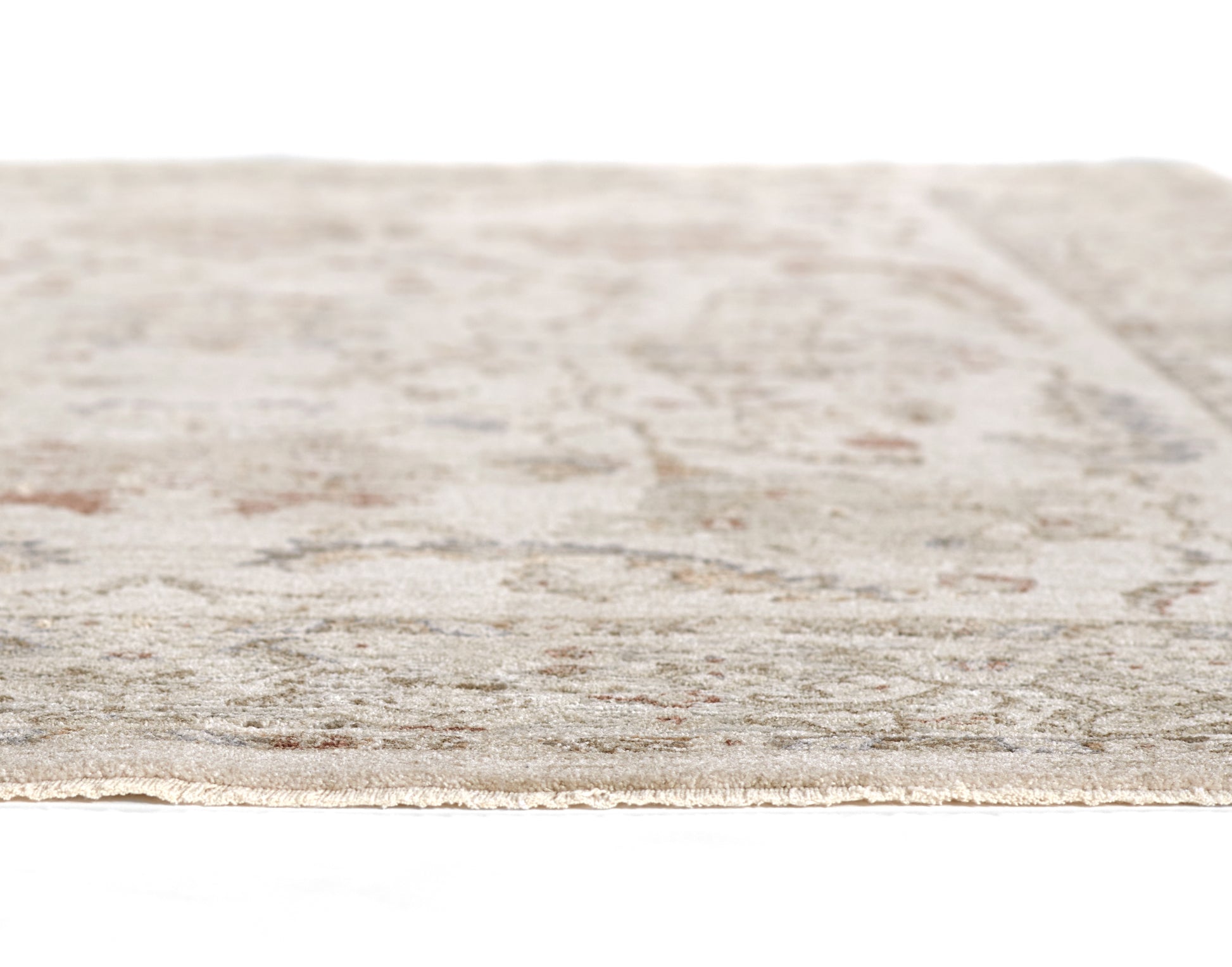 Neutral beige and taupe oriental rug with subtle floral pattern and fringe along edge.