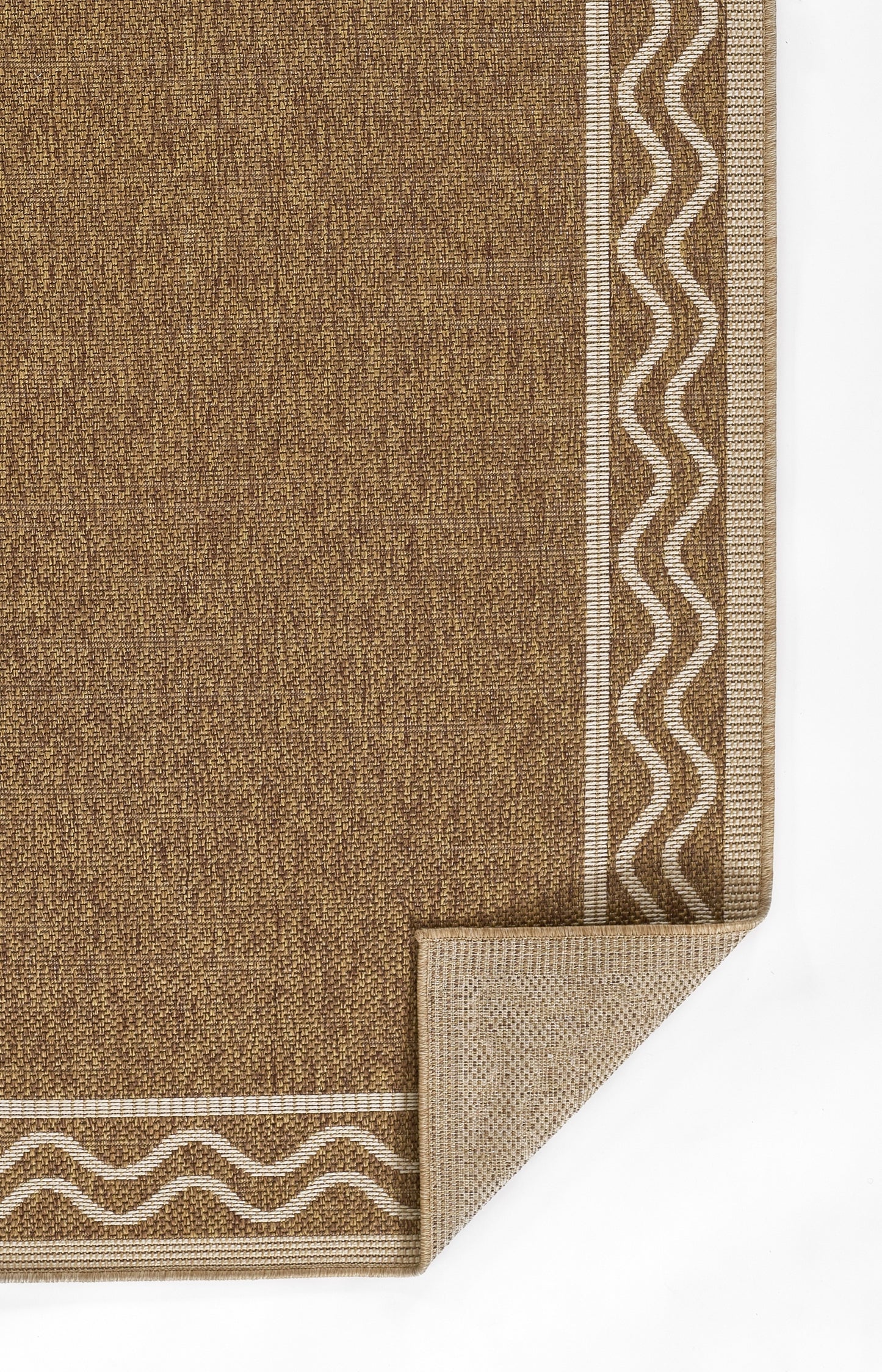 Brown textured rug with light beige border featuring a white wavy pattern; corner folded to reveal underside, natural fiber.