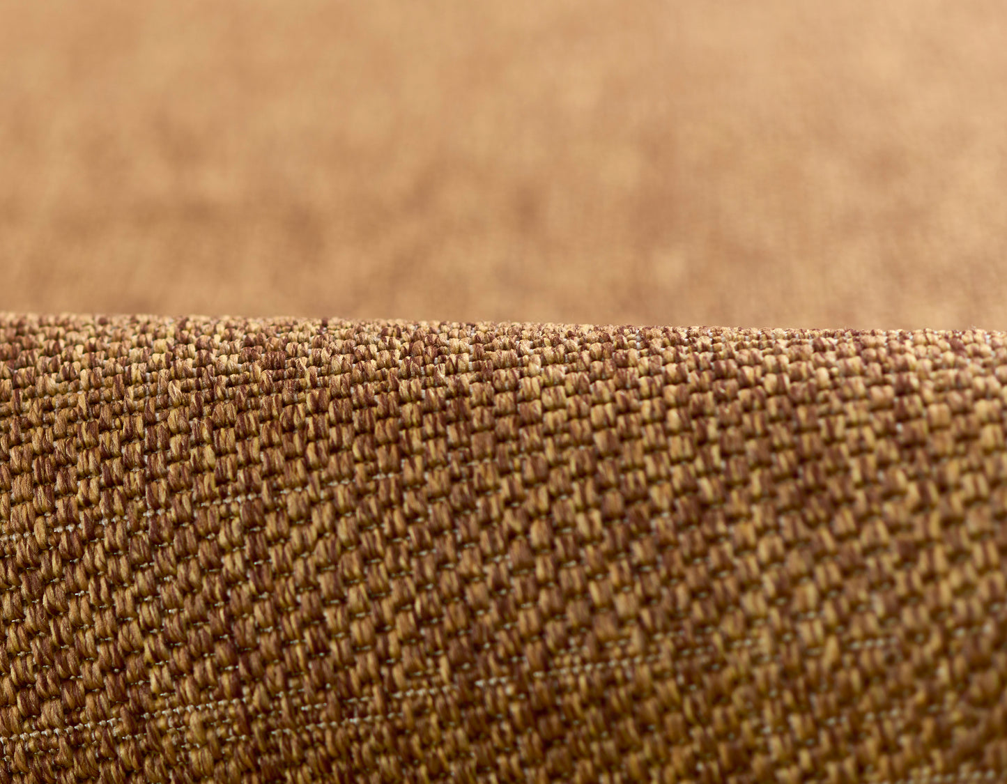 Close-up of natural brown woven rug runner with a tight textured weave.