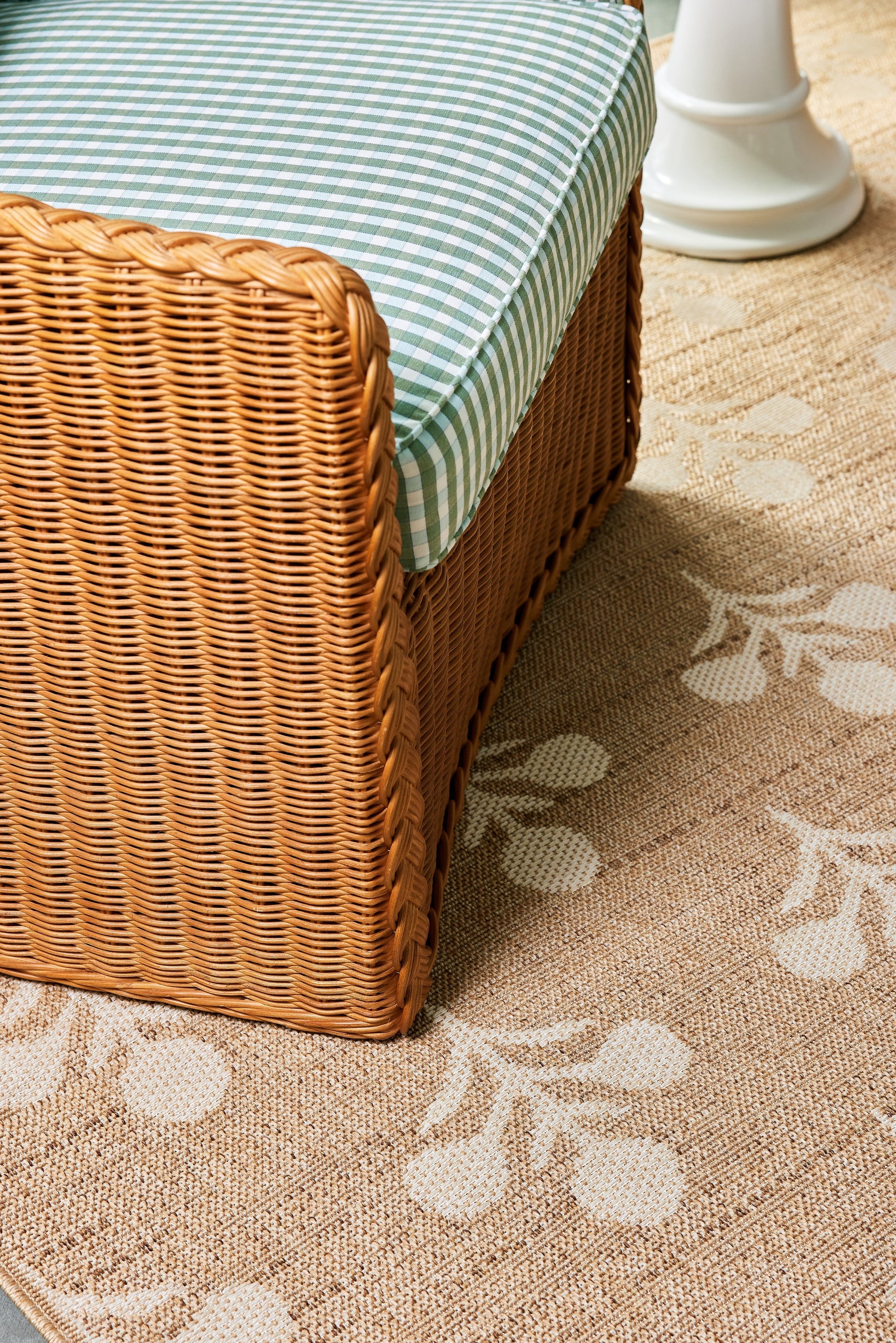 8' x 10' beige rug with a subtle pattern.