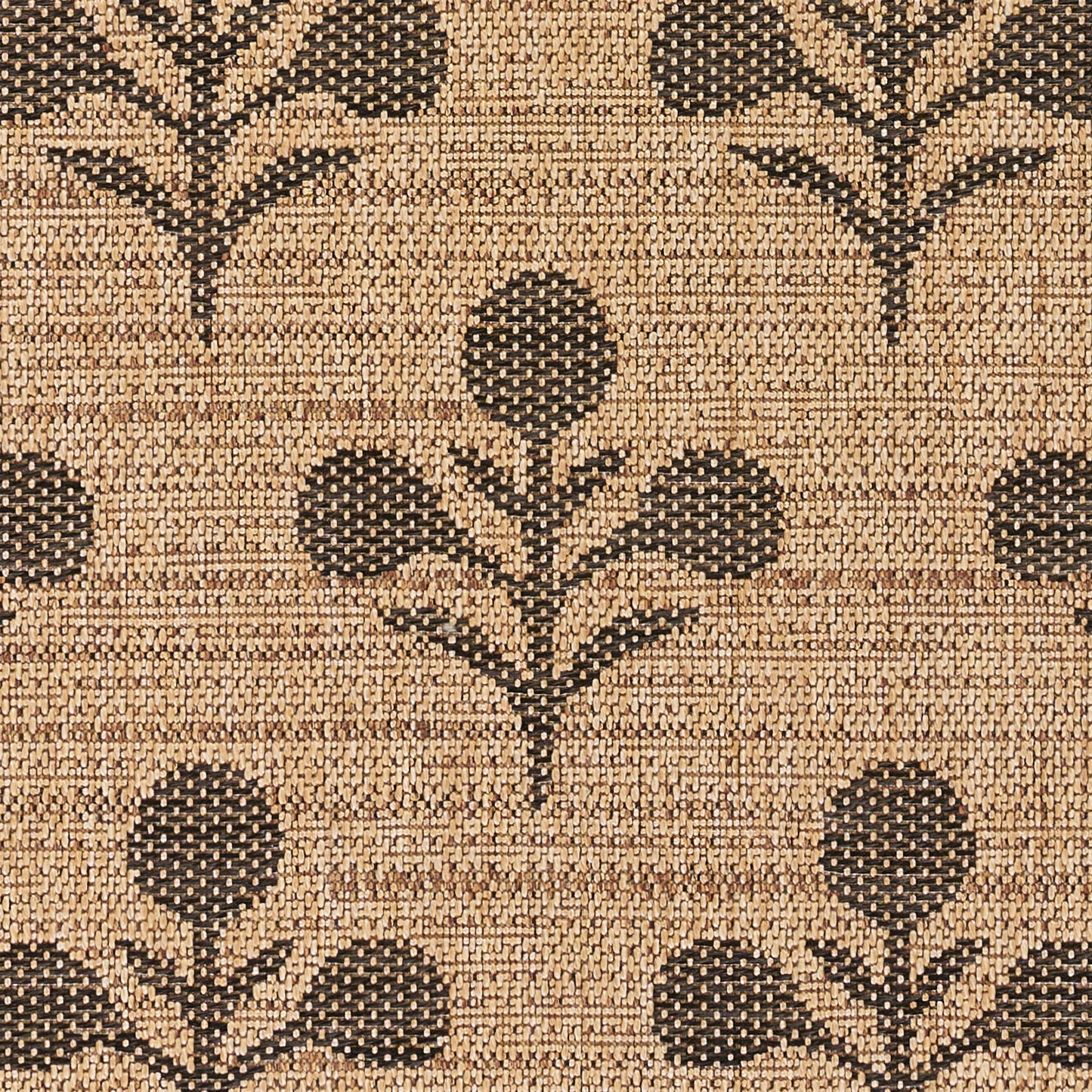 Beige woven rug with dark brown tulip-like floral motifs; textured jute/sisal look, rectangular decorative rug