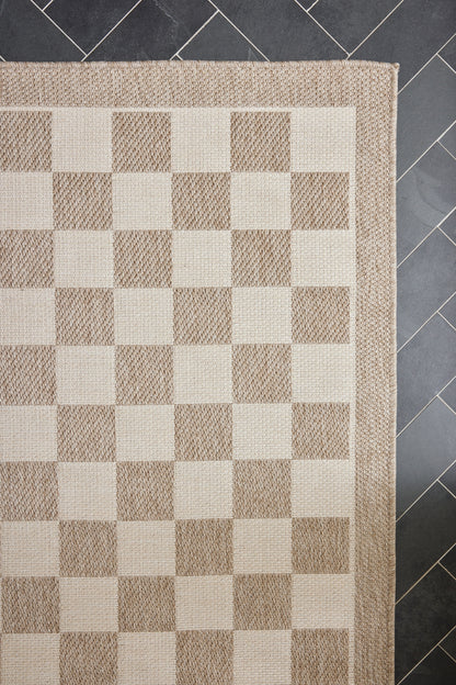 Rectangular beige & ivory checkerboard woven rug with a textured border, natural jute/sisal look.