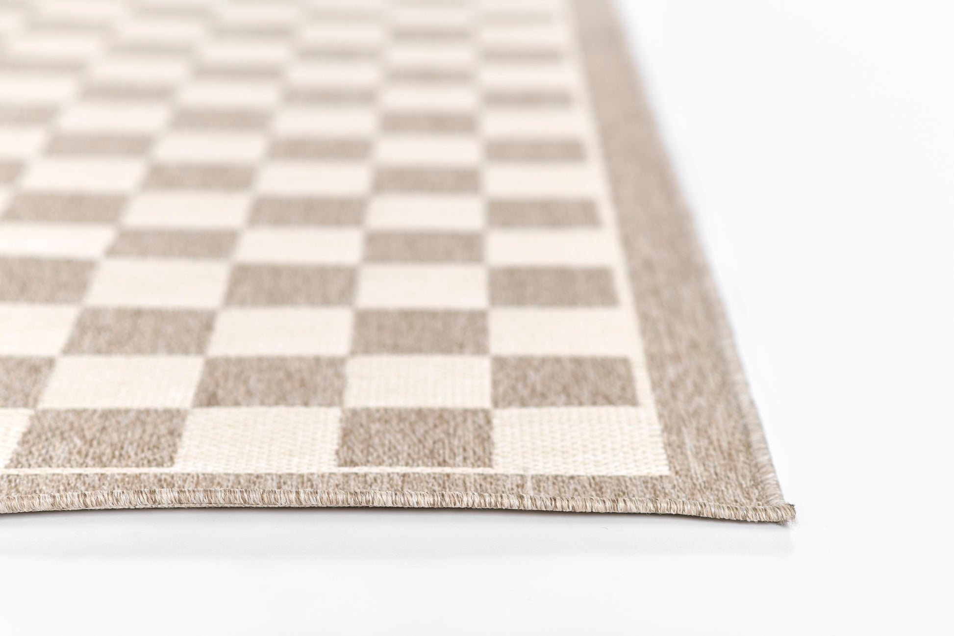 Beige and ivory checker woven rug with natural fiber texture, rectangular floor decor.