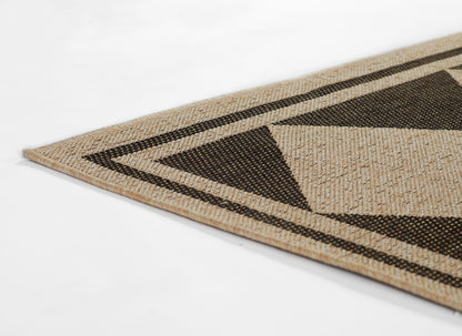Natural beige jute rug with black geometric triangles & border; rustic rectangular floor mat.