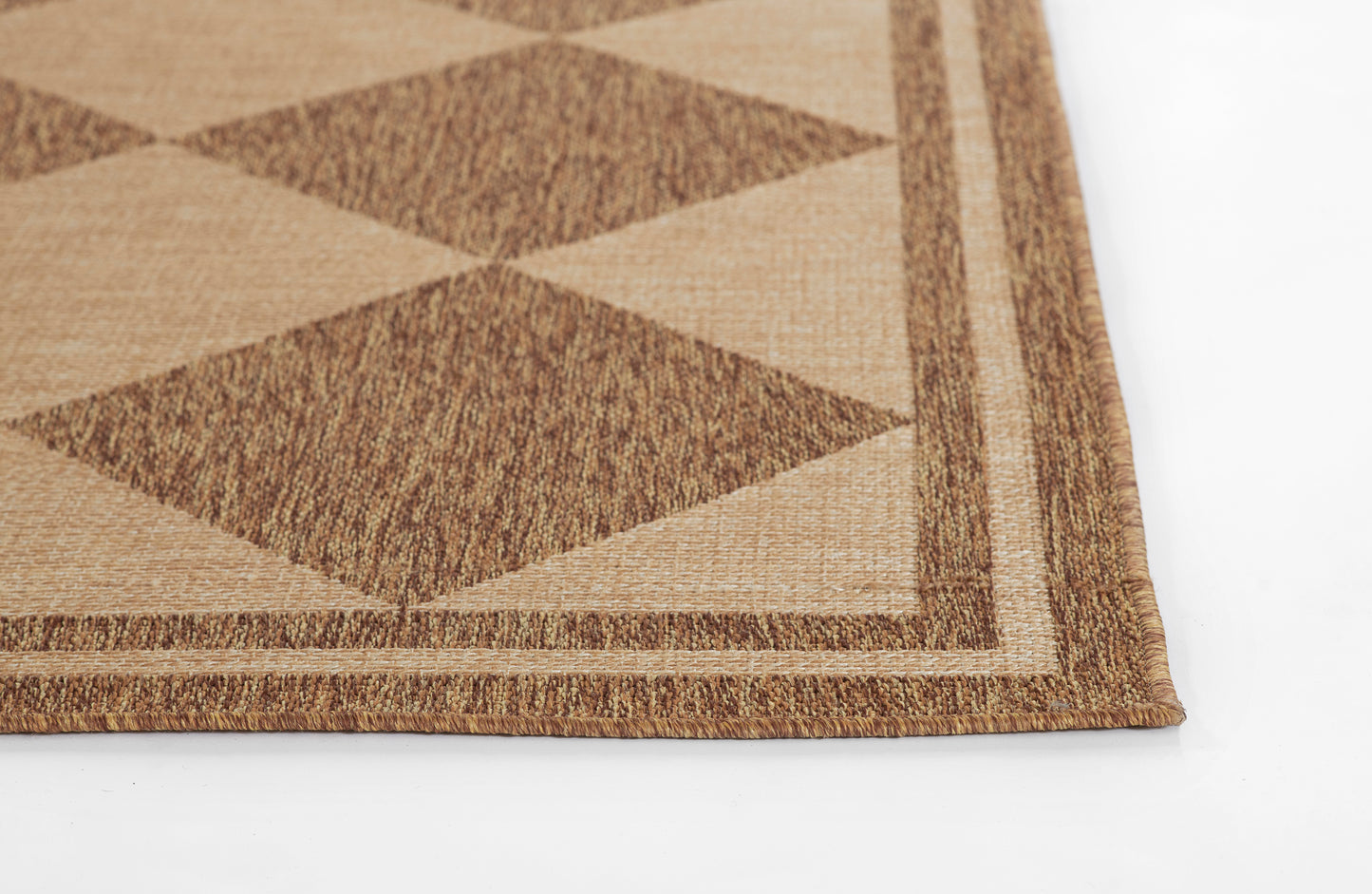 Natural beige & brown woven rug with diamond pattern & brown border.
