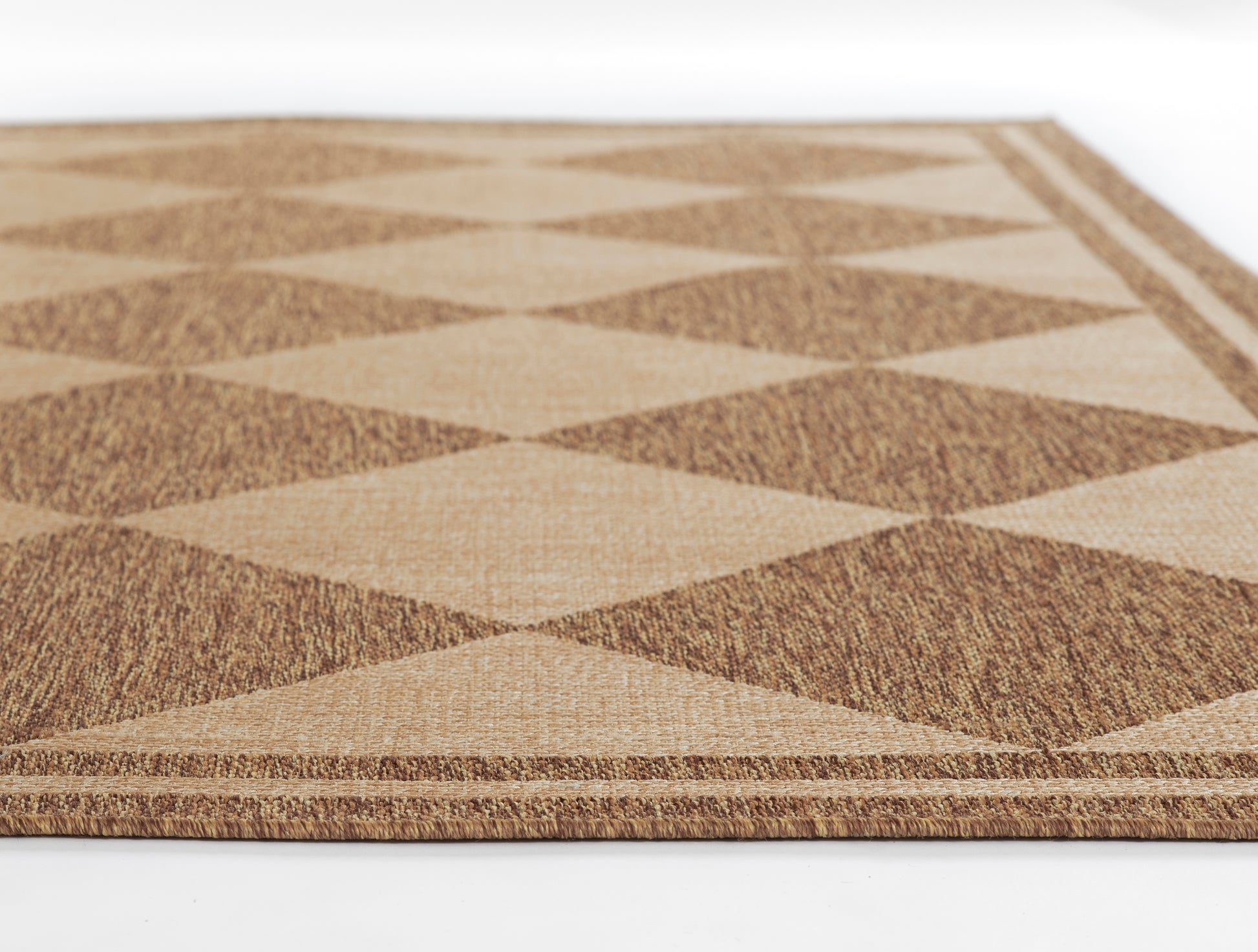 Natural beige and brown diamond-pattern rug with a woven, jute-like texture and bordered edges.